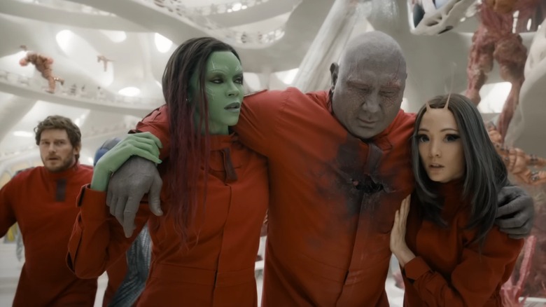 Gamora and Mantis carrying Drax