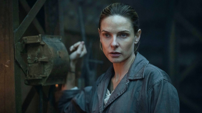 Juliette pulling a lever in Silo (2023)