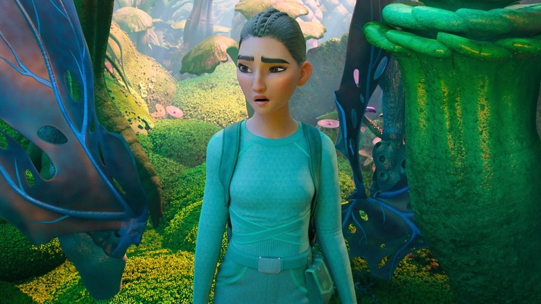 Eva Nine walking through a wooded area in WondLa (2024)