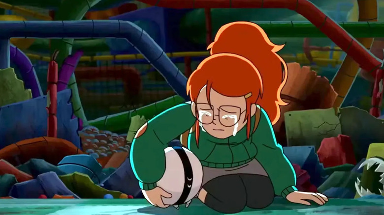 Tulip Olsen cries as she holds One-One while crouched among garbage in "Infinity Train"