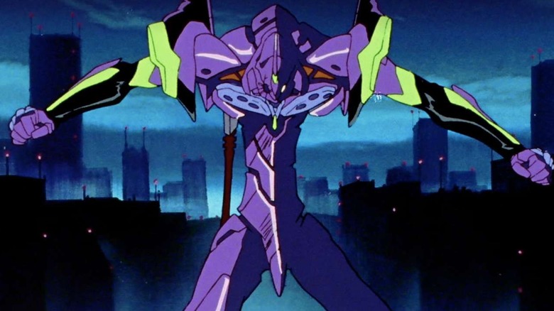 The purple EVA01 holds its arms out in a fist as it stands in front of a cityscape in "Neon Genesis Evangelion"