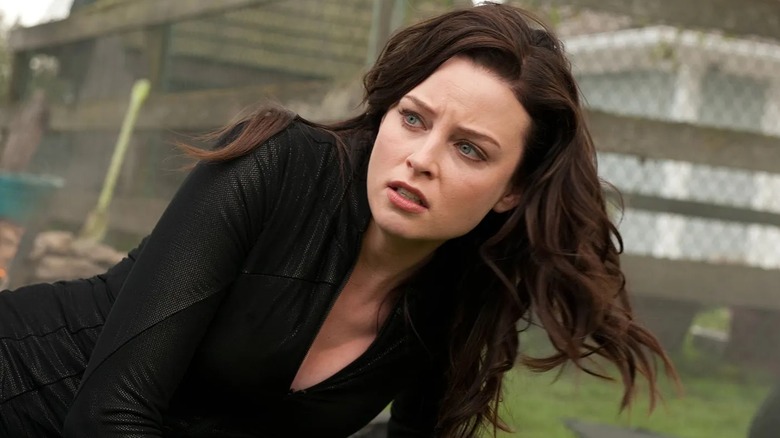 Kiera picking herself up off the ground in Continuum (2012)