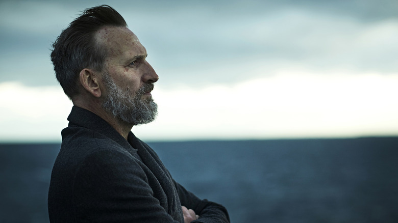 Matt Jamison staring out into the distance, lost in thought, in "The Leftovers"