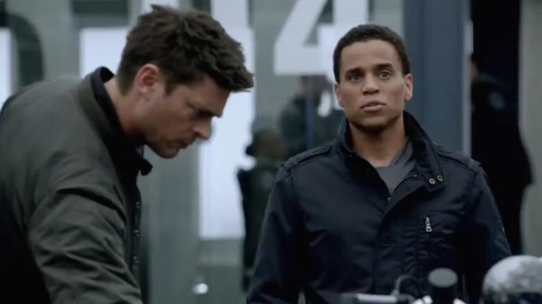 Detective Kennex and Dorian in the office on "Almost Human"