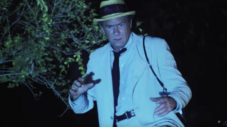 Cal Kolchak is shocked by a bright light on "Kolchak: The Night Stalker"