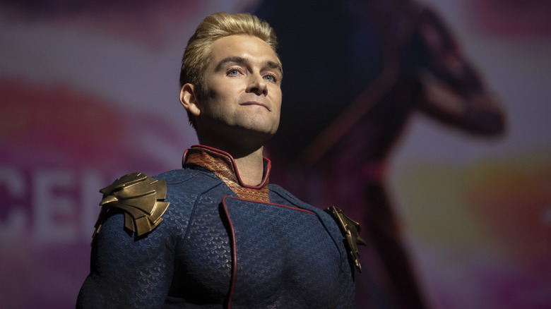 Homelander looking out from a stage with a superior stare in The Boys (2019)