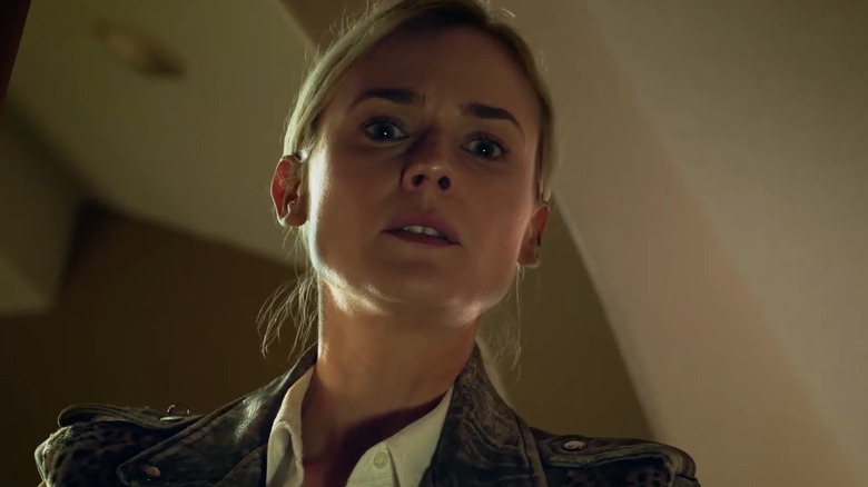 Cross looking down in "The Bridge"