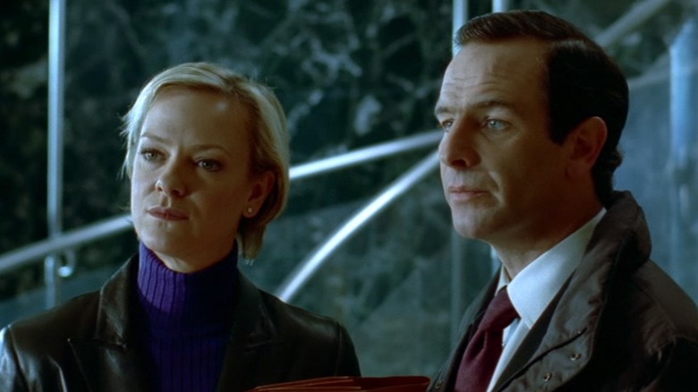 Carol and Tony looking in the same direction in "Wire in the Blood"