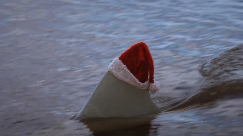 Shark fin wearing Santa hat in "Santa Jaws"