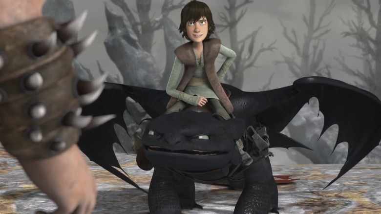 Hiccup rides the dragon Toothless