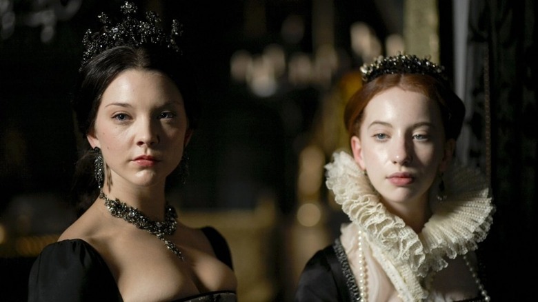 Anne and Elizabeth look on sternly