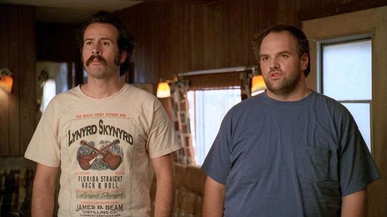 Earl and Randy Hickey standing together in their motel room in "My Name Is Earl"