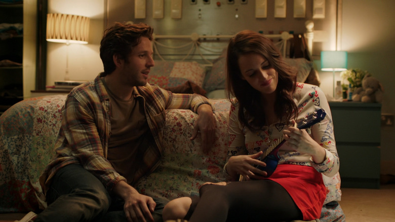 Sam watching Lulu play ukulele in "Crashing"