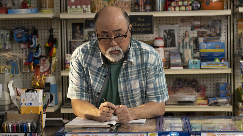 Appa behind counter at store in "Kim's Convenience"