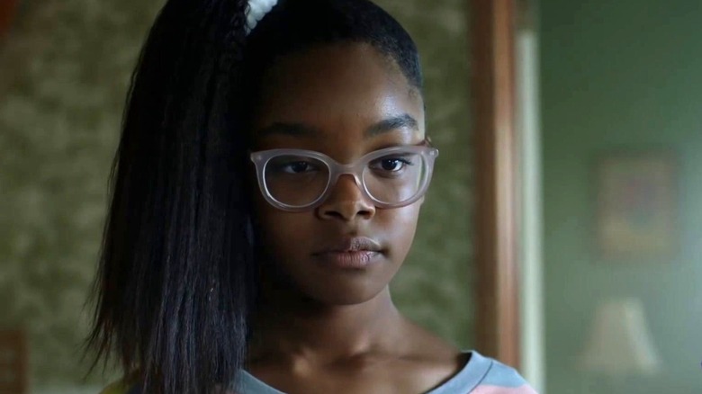 Reniece in side pony and glasses
