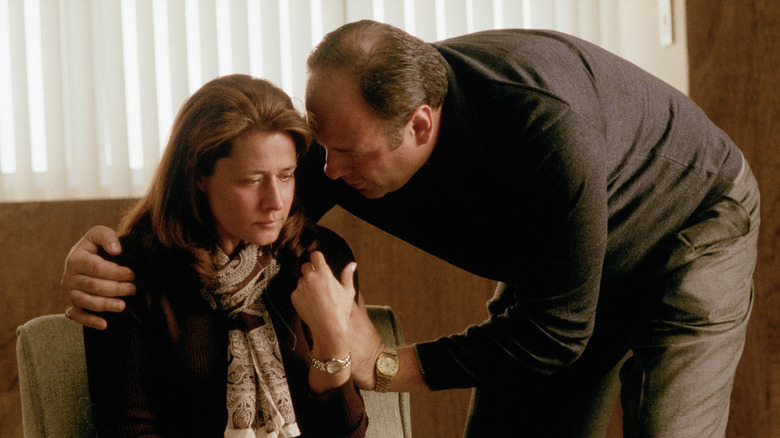 Tony stands over Dr. Melfi in her office