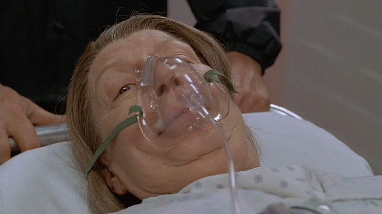 Tony chokes Livia in hospital bed