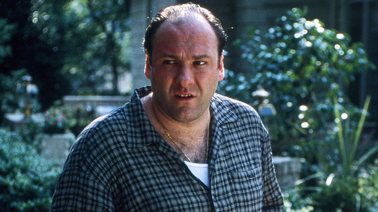 Tony looks disgusted outside