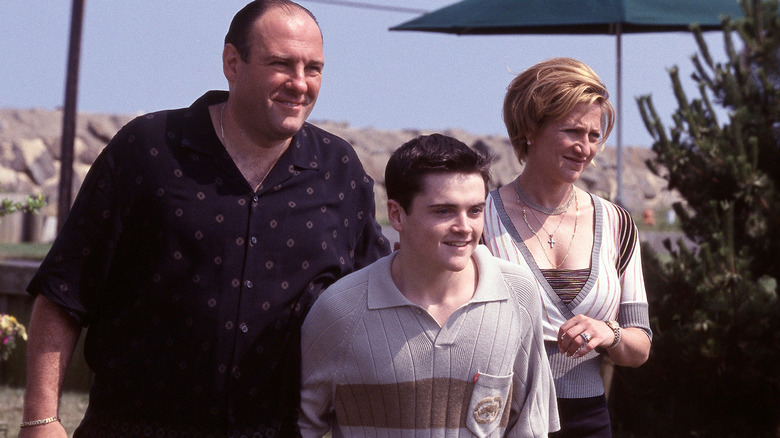 Tony, Carmela, and A.J. stand on beach
