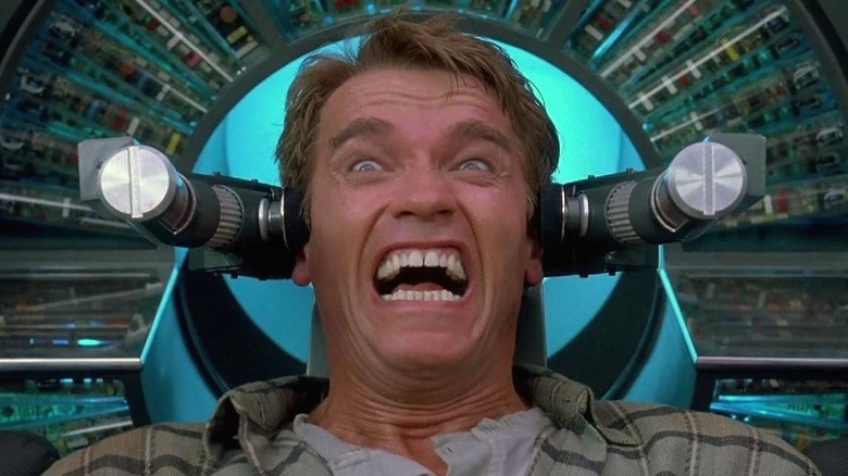 Arnie strapped into machine in Total Recall