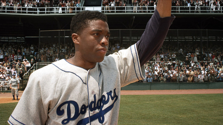Chadwick Boseman waves
