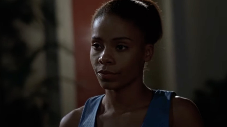 Sanaa Lathan plays basketball