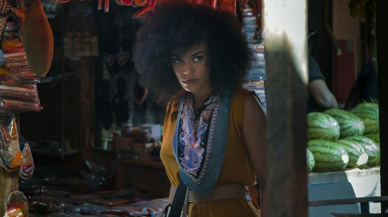 Queen Sono paying close attention in Queen Sono