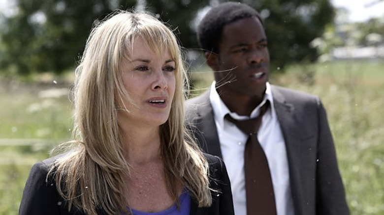 Rebecca and Callum standing together outside in "Paradox"