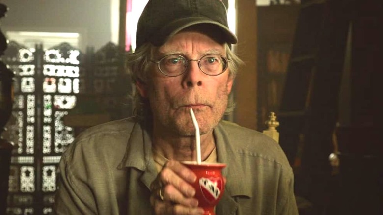 The shopkeeper drinking in "It: Chapter Two" (2019)