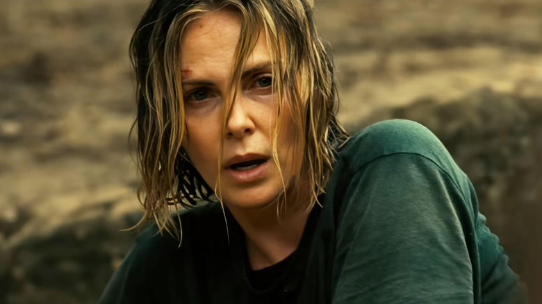 Sasha with wet hair and a cut over her eye in "Apex" (2026)