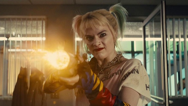 Harley Quinn shooting a gun