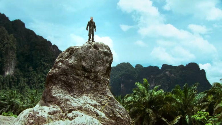 Dieter Dengler on rock in "Rescue Dawn" (2006)