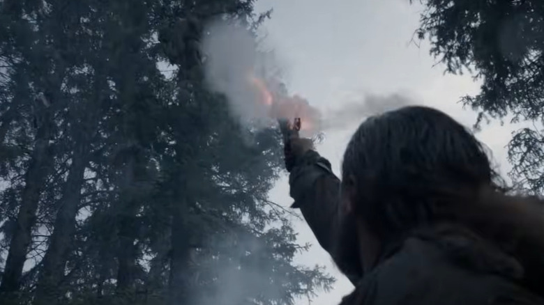 Hugh Glass shoots gun into snowy wilderness in "The Revenant" (2015)