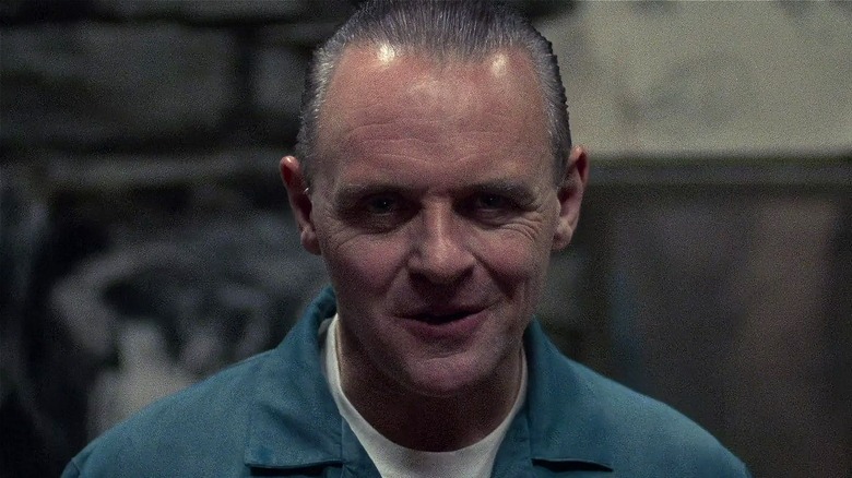 Hannibal Lecter smirking in The Silence of the Lambs (1991)