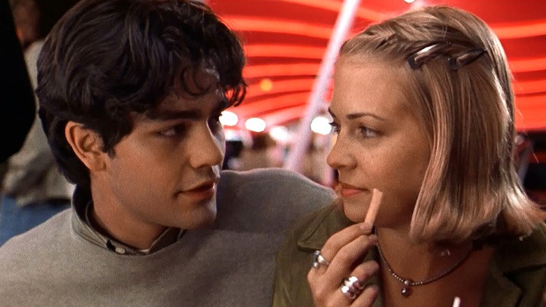 Adrian Grenier smiling at Melissa Joan Hart