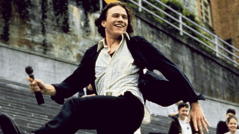 Heath Ledger smiling and dancing