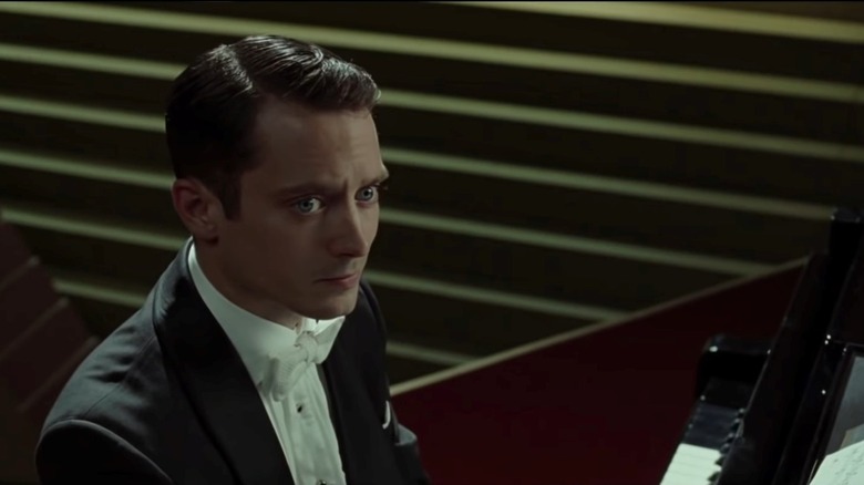 Tom Selznick sitting nervously