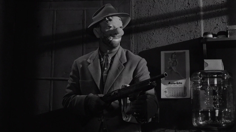Johnny Clay with gun