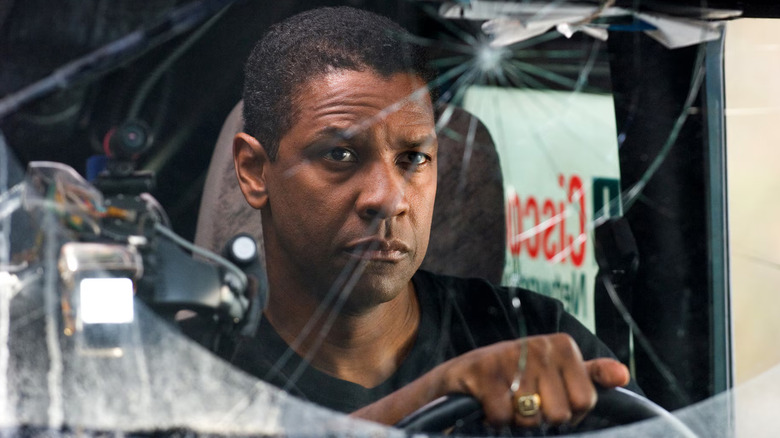 Agent Doug Carlin driving shot up car in "Deja Vu" (2006)