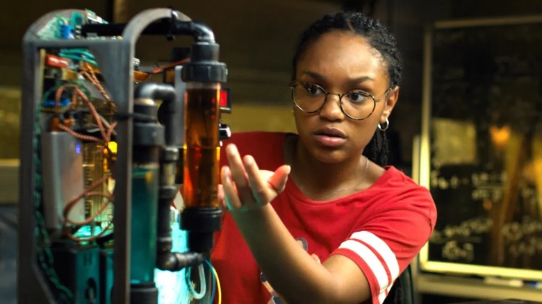 C.J. examining a device in "See You Yesterday" (2019)