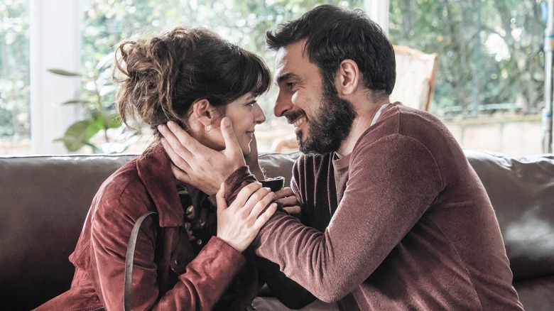 Dante and Alice embracing in "Still Time" (2022)