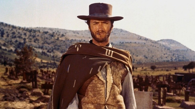 Blondie standing in front of a mountain range in "The Good, the Bad and the Ugly."