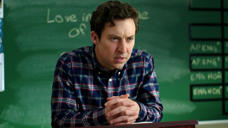 Evan stares at Kayla from his podium in "English Teacher"