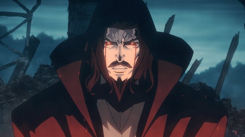 Dracula in red cloak standing near burnt ruins in "Castlevania" (2017-2021)