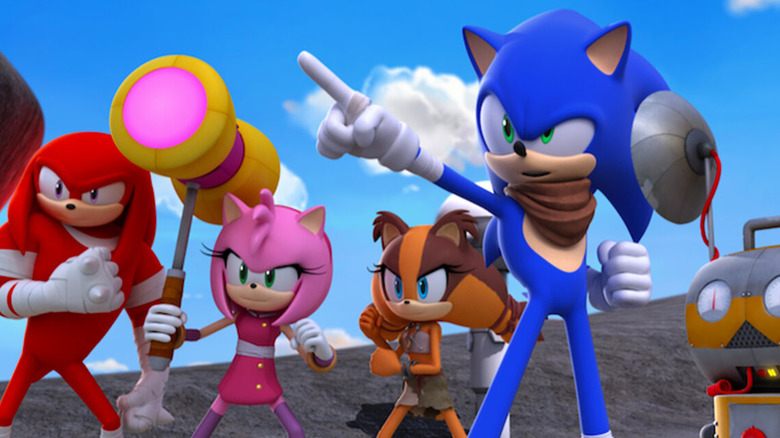 Sonic points as Knuckles, Amy, and Sticks stand guard in "Sonic Boom" (2014-2017)