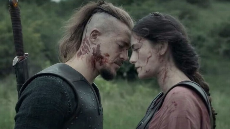 Uhtred holds his head to Brida on The Last Kingdom
