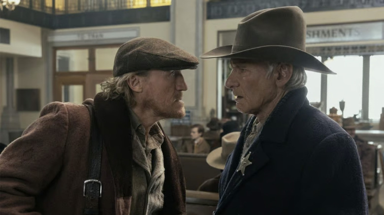 Banner confronts Jacob Dutton at the train station in "1923" (2022-2025)