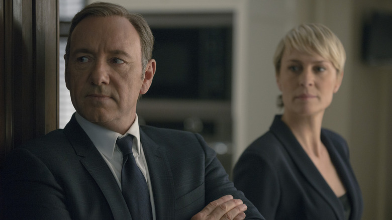 Frank and Claire stand in a doorway in "House of Cards" (2013-2018)