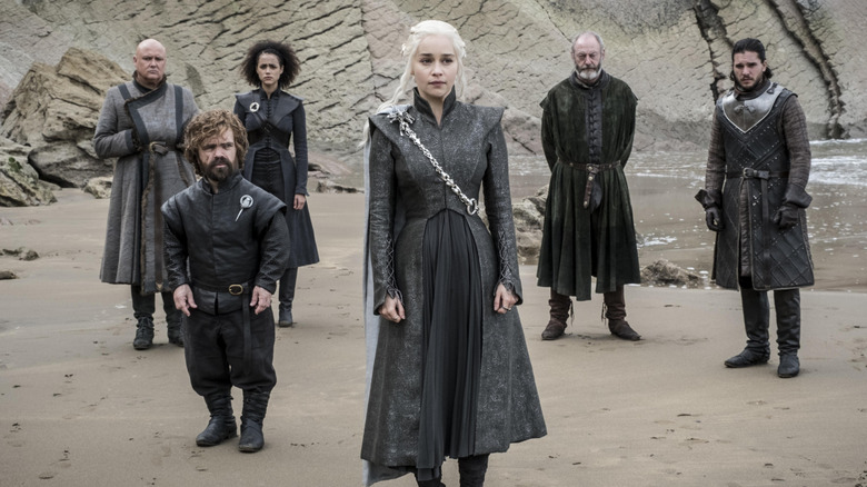 Lord Varys, Missandei, Tyrion, Daenerys, Davos, and Jon Snow standing outside together (2017)