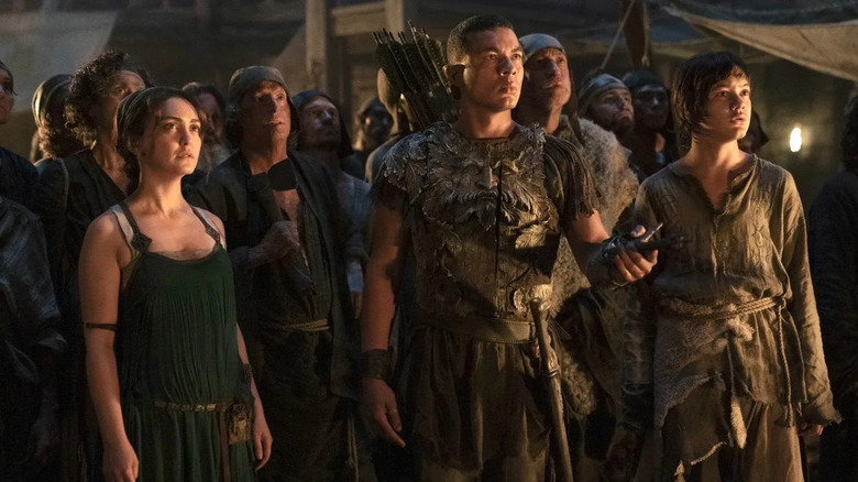 Arondir leads a group of villagers in "The Rings of Power" (2022-present)